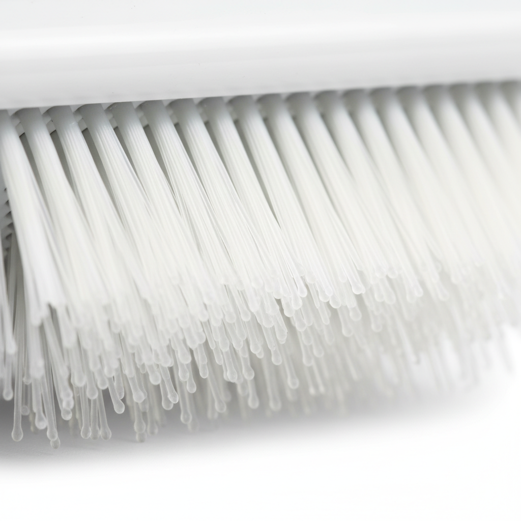 Close-up of soft flexible bristles on pet grooming brush